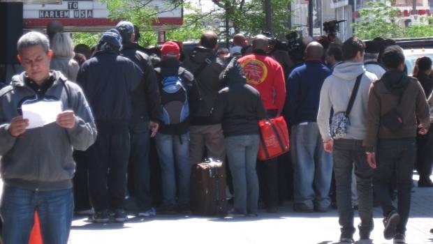 A crowd gathered to watch the unveiling.